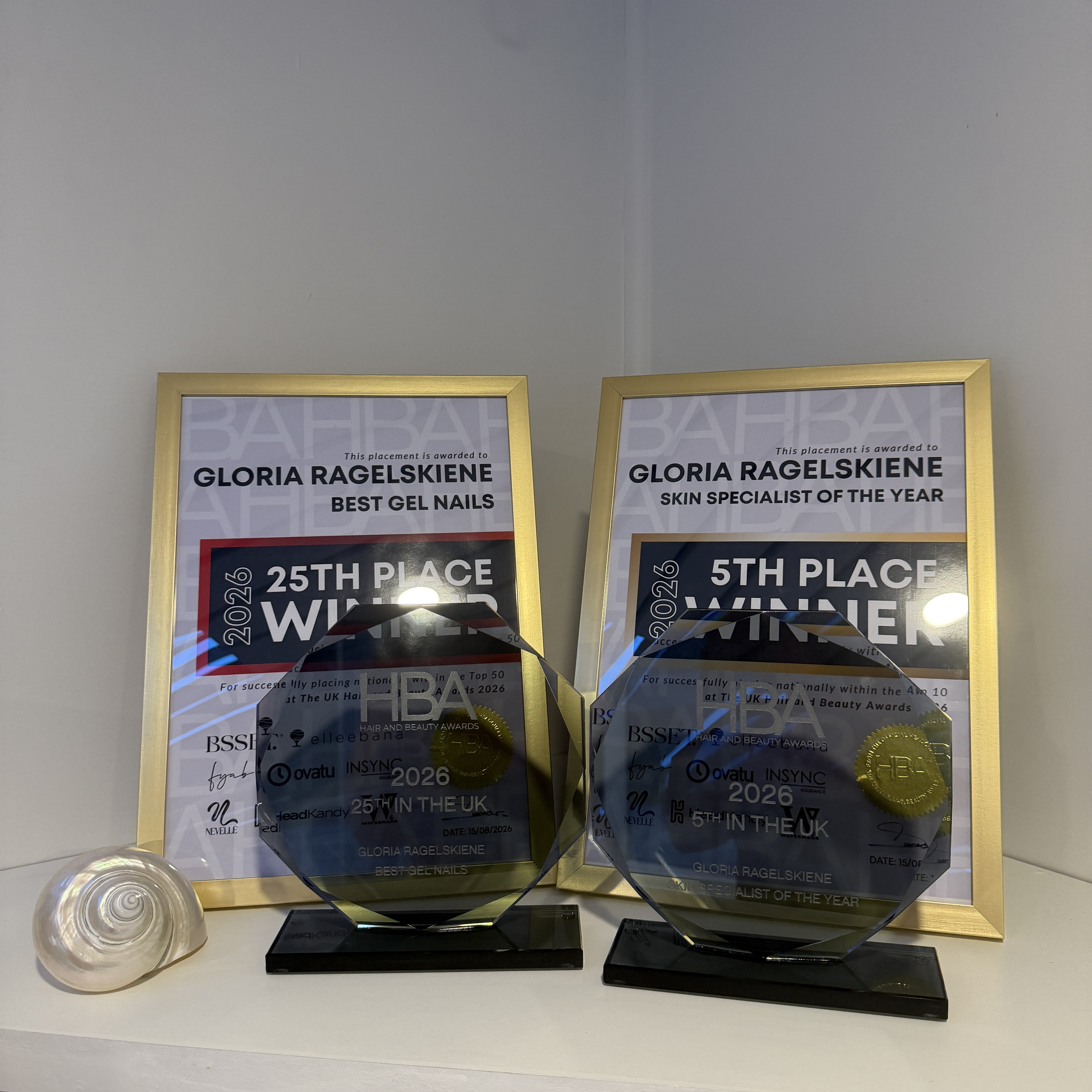 Gloria’s Hair and Beauty Awards certificates and trophies
